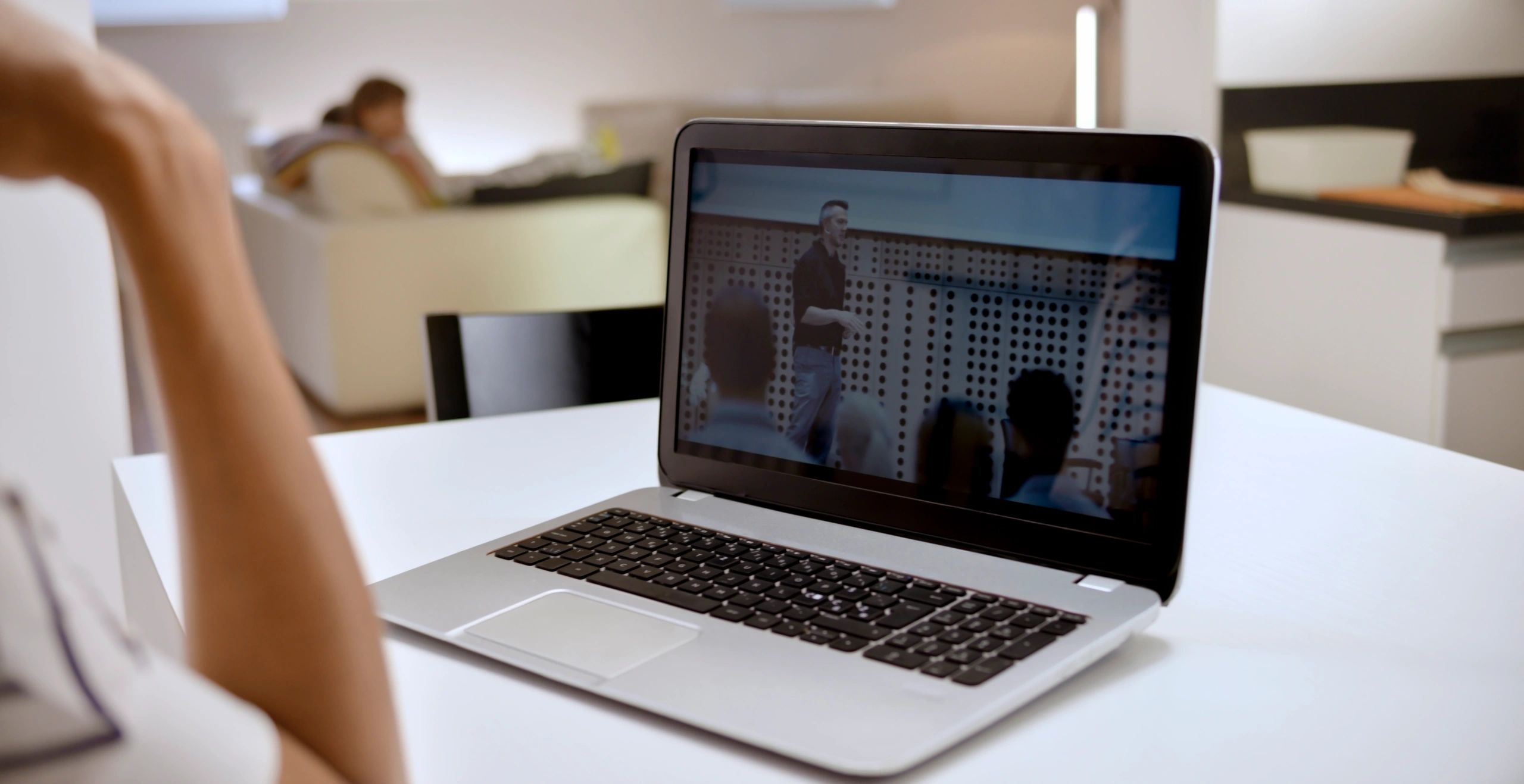Woman on a video call on a laptop at home