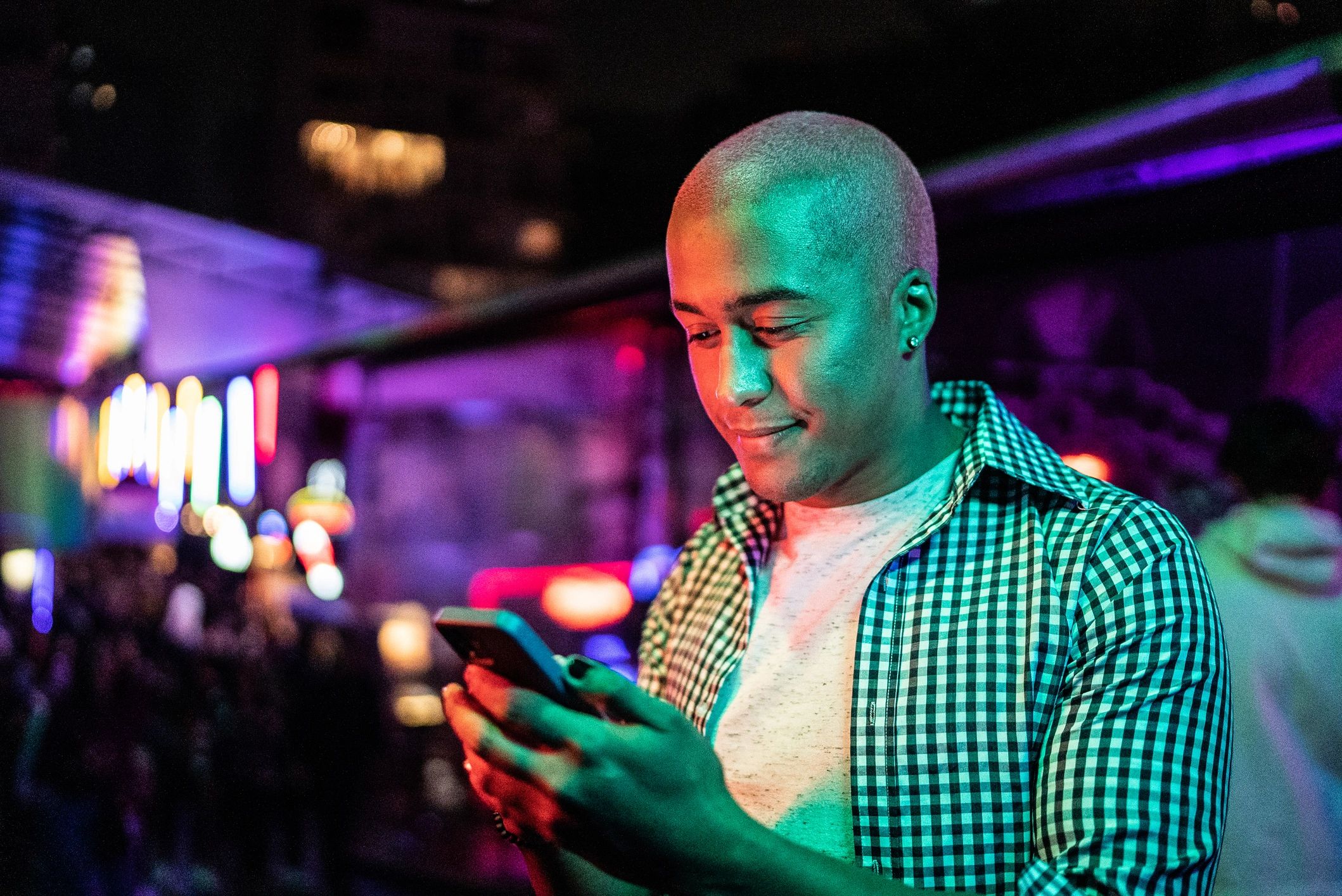 Person using a smartphone at night